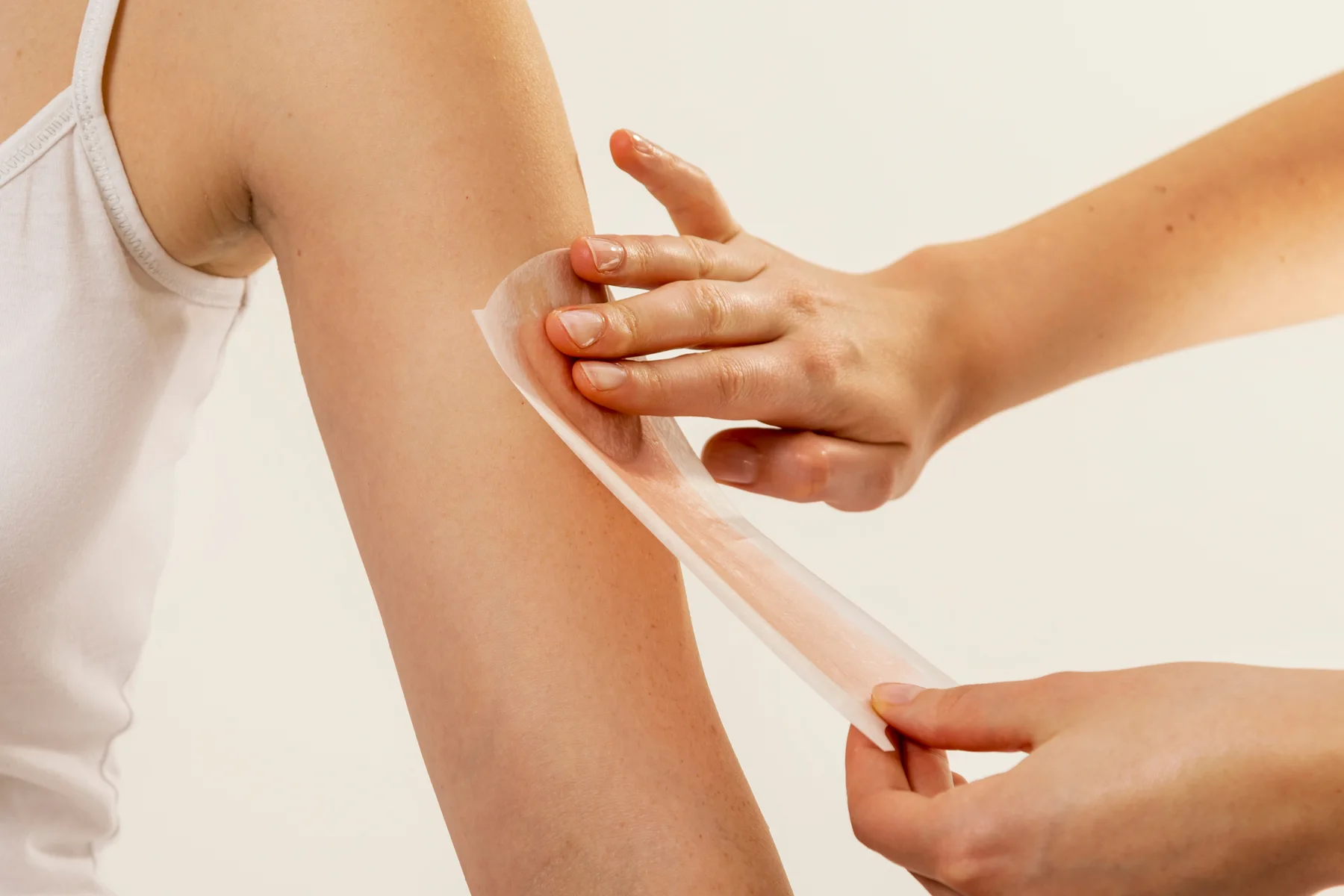 Professional waxing treatment imagery for Full-Arm Waxing