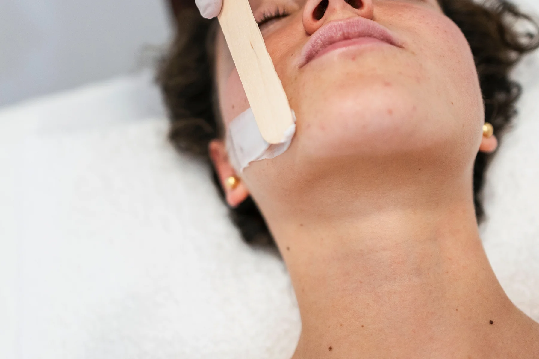 Professional waxing treatment imagery for Full-Face Waxing